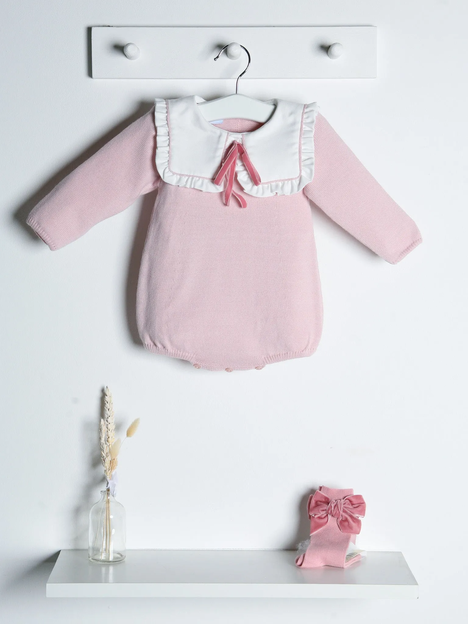 Baby Etta Pink knitted romper with bib collar