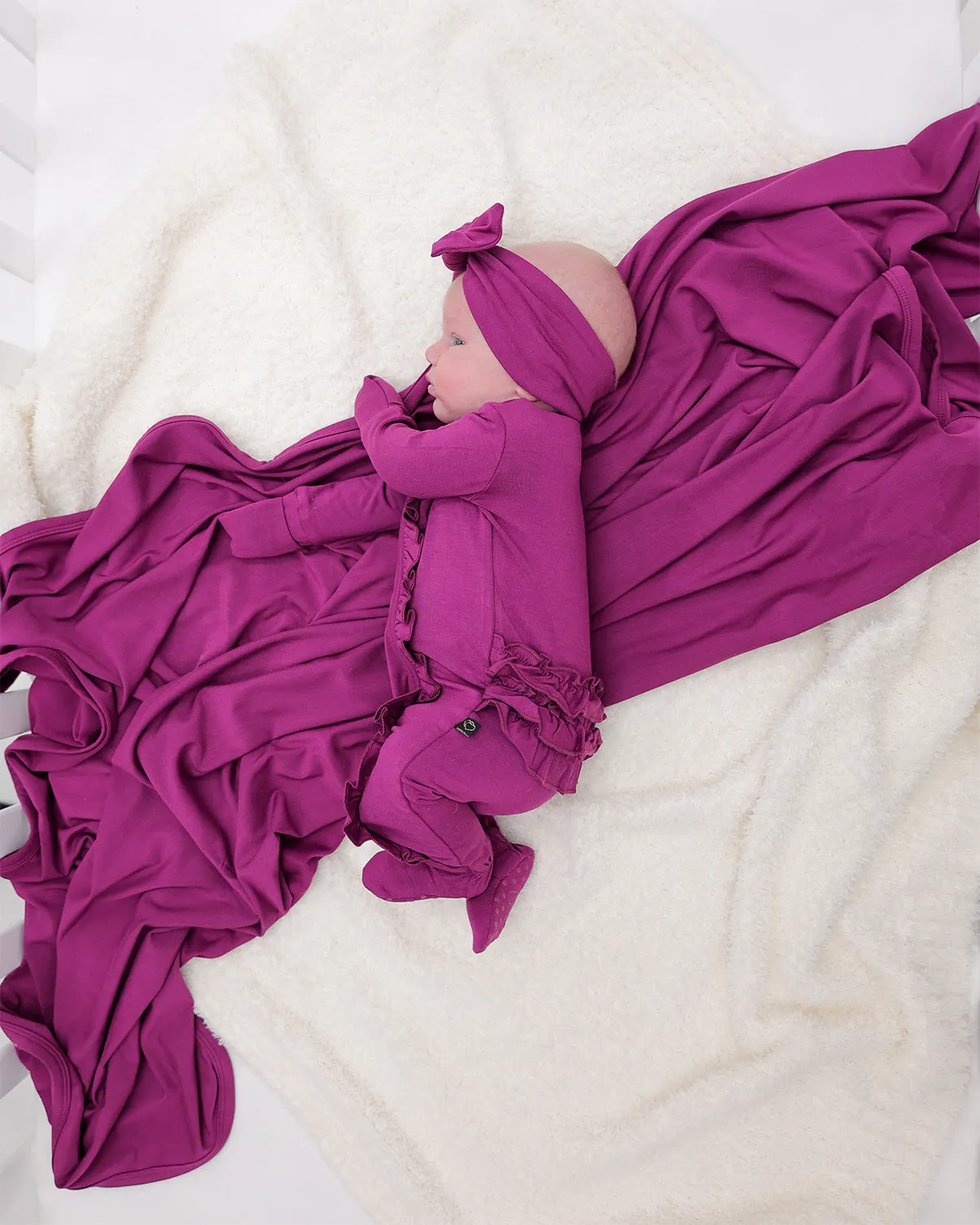 Plum Ruffle Zipper Footie