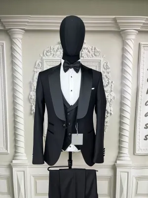 Single Button Three Pieces Tuxedo Suit with contrasting green velvet Lapel, matching bow tie and Black Pants.